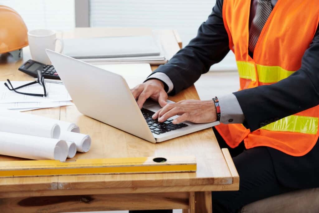 engineer typing at a computer